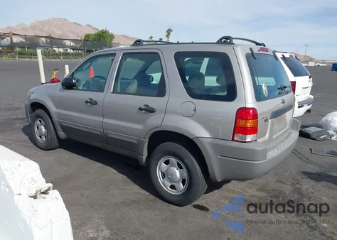 2001 Ford Escape Xls from USA, damaged, VIN 1FMUU01BX1KE98117